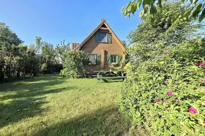 Image de Summer house made of wooden beams