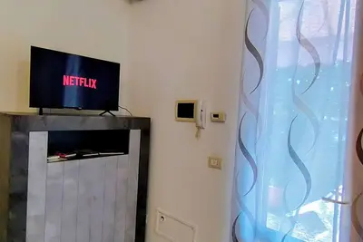 Image de The gem of Pisa apartment with garden parking self check in