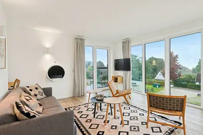 Image de Joli appartement pour 8 personnes avec bain à remous, Wifi, piscine, Tv, balcon et animaux admis