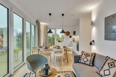 Image de Agréable appartement avec bain à remous, Wifi, piscine, Tv, balcon et animaux admis