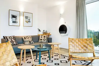 Image de Bel appartement avec bain à remous, piscine, Wifi, Tv, balcon et animaux admis