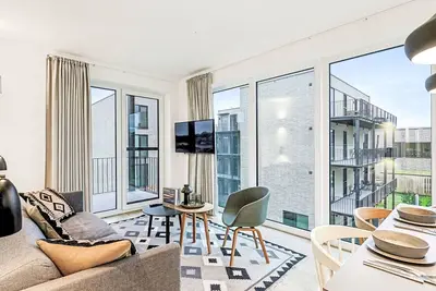 Image de Joli appartement avec piscine, bain à remous, Wifi, Tv, balcon et animaux admis