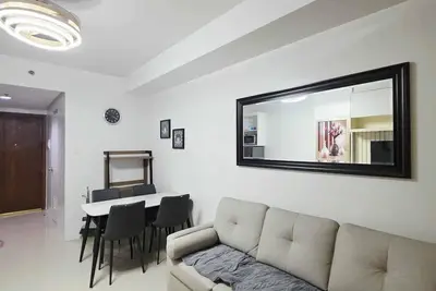 Image de Appartement idyllique à louer - Parfait pour un court séjour face au Mall of Asia