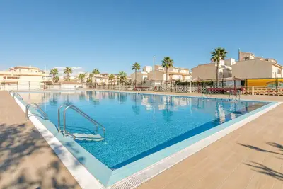Image de Bungalow « Manuel 217 à Gran Alacant » avec piscine commune, Wi-Fi et climatisation