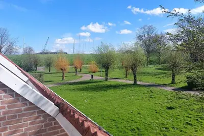 Image de \"Deichperle\" - beautiful maisonette apartment in the Aquadelta vacation park in Zeeland