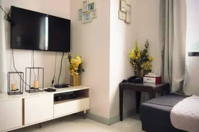 Image de Escapade spacieuse au cœur de Davao City - Appartement spacieux avec piscine partagée