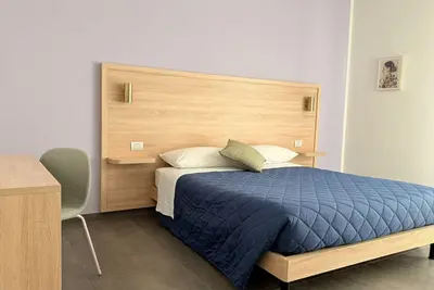 Image de Discover Apartment Lorenzo, an elegant residence situated in a quiet area just 15 minutes from Florence. Tastefully furnished with high-end finishes, this apartment is designed for those seeking a refined environment that meets every need. Perfect for fam