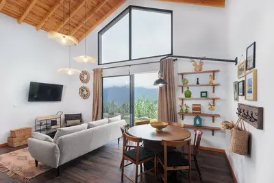 Image de A mountain chalet with breathtaking views by Lavibes, located in São Vicente
