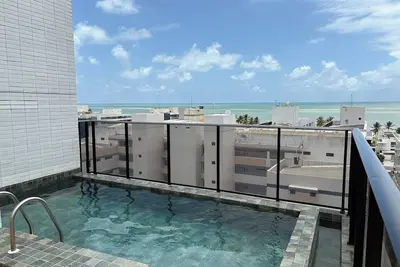 Cozy and modern apartment with balcony.