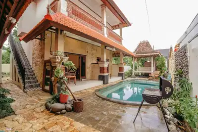 Image de Charming 8-bedroom guesthouse with shared kitchen, only 1 km from the beach.