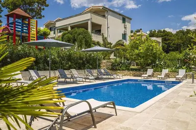 Image de Maison confortable à Podstrana avec piscine privée, utilisable à.