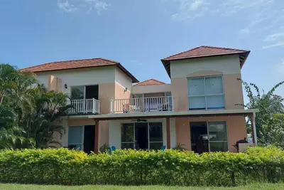 Image de 🌴 Coastal Paradise – Townhouse with Golf, Beach Club & Nature