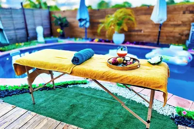 Image de Villa avec piscine, jaccuzi, plage et Literie Hilton