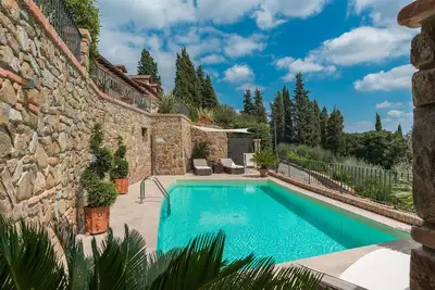 Image de Villa Le Panteraie avec piscine et vue panoramique