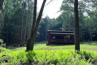 Image de cabin with hot tub in Benezette - Perfect for a cozy getaway