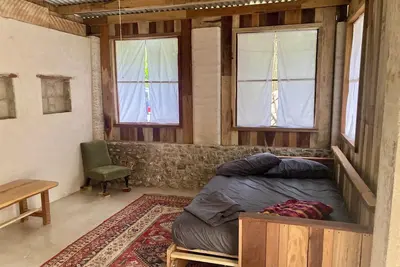 Image de Serene 1-bedroom cottage in organic garden near Xaibe perfect for relaxing stays