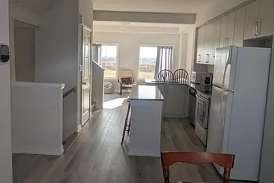 Image de Clean, spacious 3 bedroom townhouse. Family friendly, relaxing stay free Wifi.