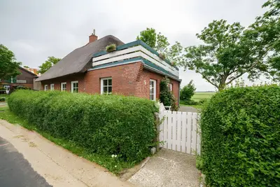 Image de Appartement 'Pellwormer Rosen Hus' avec jardin commun, balcon et Wi-Fi