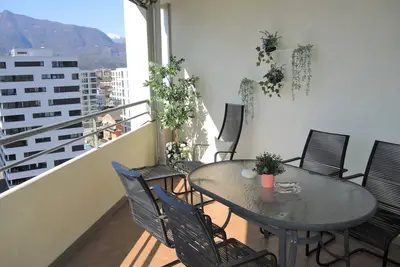 Image de Appartement au 8ème étage avec un panorama unique sur la ville de Locarno