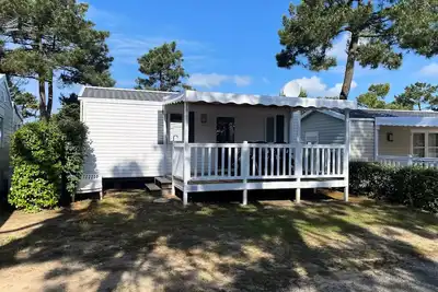 Image de Dim - Loisir Confort 2ch/4p - 25m² - Terrasse couverte 4 personnes