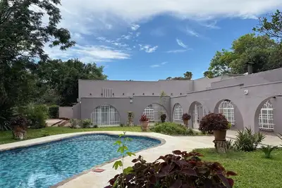 Image de Peaceful 4-Bedroom Retreat with Lush Gardens & Pool – Highlands - 2346