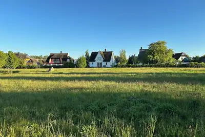 Image de Arkonablick Eg in the two-family house, first row to the sea. Dogs allowed.