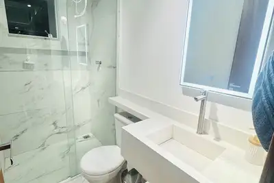 Image de Cozy, air-conditioned house in Florianópolis, 2 suites - 20 minutes from Jurerê.