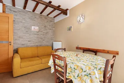 Image de Appartement « L'Arnica » avec vue sur le lac et Wi-Fi