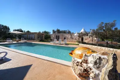 Image de Trullo Samanta - Trullo avec piscine pour des vacances dans les Pouilles
