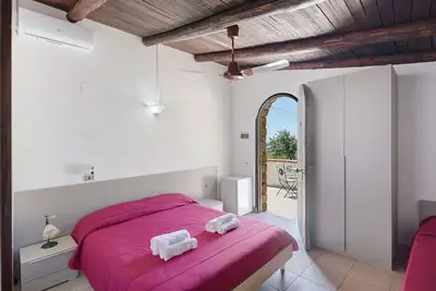 Image de Chambre « Camera Tramonto Vista Mare » avec vue mer, Wi-Fi et climatisation