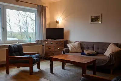 Image de Appartement 'Fewo Buten, 55 m², max. 5 personnes' avec jardin commun et Wi-Fi