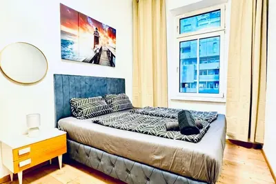 Image de Cozy 4br Apt for up to 12p. 10-Min to Fac Platz