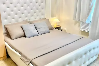 Image de Appartement confortable à Iloilo City avec piscine et salle de sport partagées