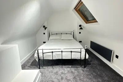 Image de Appartement Signature Dippen Hall - À quelques minutes de Lgw