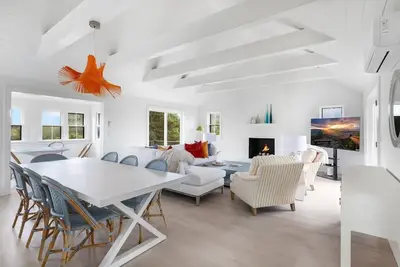 Open floor plan home with multiple decks