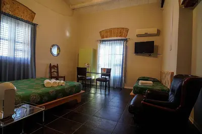 Image de An ancient Sicilian house with a sea-view terrace in the heart of the city.