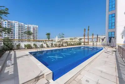 Image de StayShort - Hidden Jewel 1 minute walk from Al Furjan Metro Sleeps 5