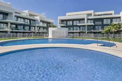 Image de Penthouse de luxe à Zahara avec piscine partagée, Wi-Fi et climatisation