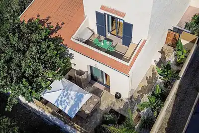 Image de A Piaghja | Duplex rénové à 150 m de la plage, jardin & clim, Marana