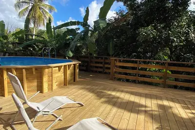 Image de Ti Bambou nature, Gite/studio 2pers - Spa/Jacuzzi - Bas de villa piscine commune