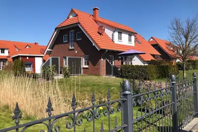Image de Maison de vacances « Deichblick » avec vue magnifique, confortable et accueillante