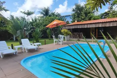 Image de Casa Villa da Apa, with its cinematic sunsets, welcomes pets.