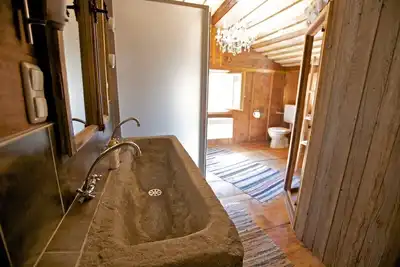 Image de 1 min. from the ski area, very old house with charm, sauna and waterfall behind the house