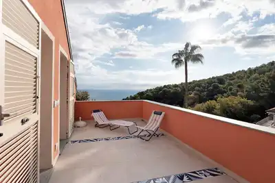 Image de Appartement 'Verde Mare' avec vue sur mer, terrasse privée et Wi-Fi
