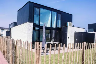 Image de Nieuwe vakantiewoning met tuin dicht bij strand