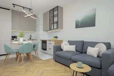 Image de Marynin 33a Warszawa | Pastel Apartment with Garden, Parking and Desk for Remote Work