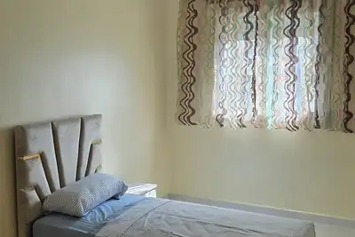 Image de Appartement familial proche cafés & commerces – à 10 min du stade