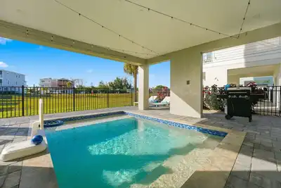 Image de ⚓New Listing Discounts! Canal Home-Heated Pool, Game Room, Tesla Charger, & More⚓