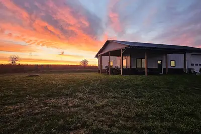 Image de Modern home on acreage with pond, trails, rolling hills, and sunset views