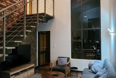 Image de Beautiful 2-bedroom Penthouse apartment in cool Sandton neighbourhood